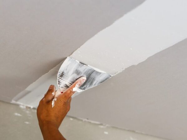 Ceiling repair work during a home renovation